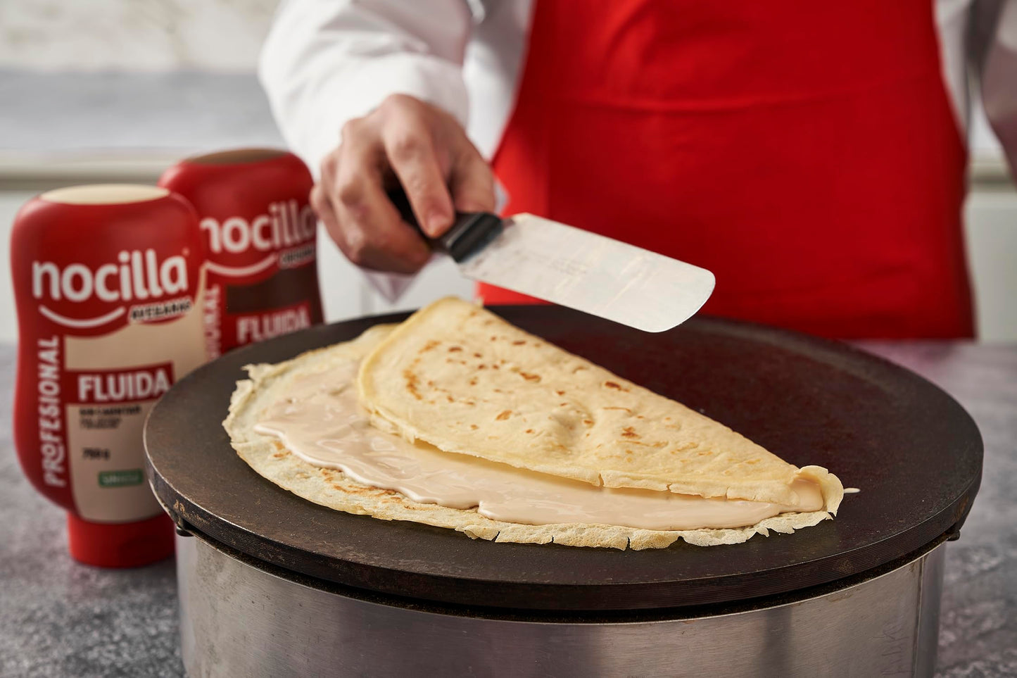 Nocilla, Profesional, Fluida con Sabor Avellanas, Bocabajo sin Aceite de Palma - 750g