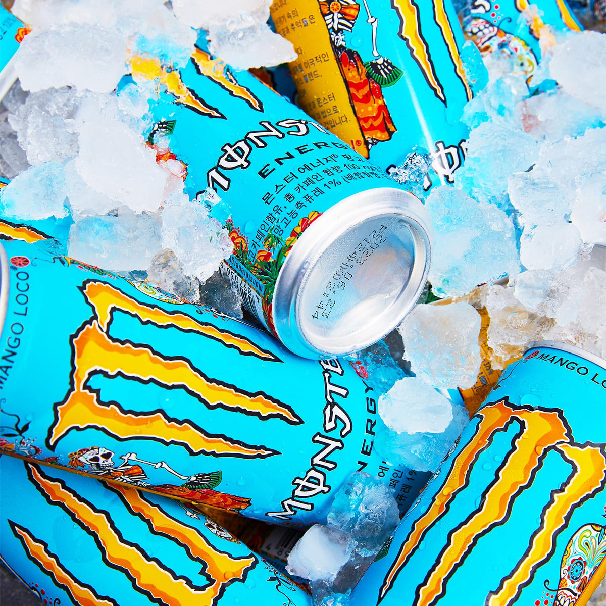 Monster Energy Mango Loco con zumo de mango, con ácido carbónico, paleta de bebidas energéticas 24 x 500 ml y adhesivo gratis